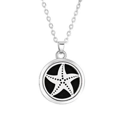 Collar difusor de aromaterapia en acero inoxidable con diseño de estrella de mar, ideal para aceites esenciales.
