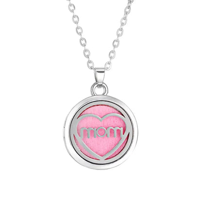 Collar difusor aromaterapia en acero inoxidable con corazón rosa y la palabra 'mom' ideal para regalar.
